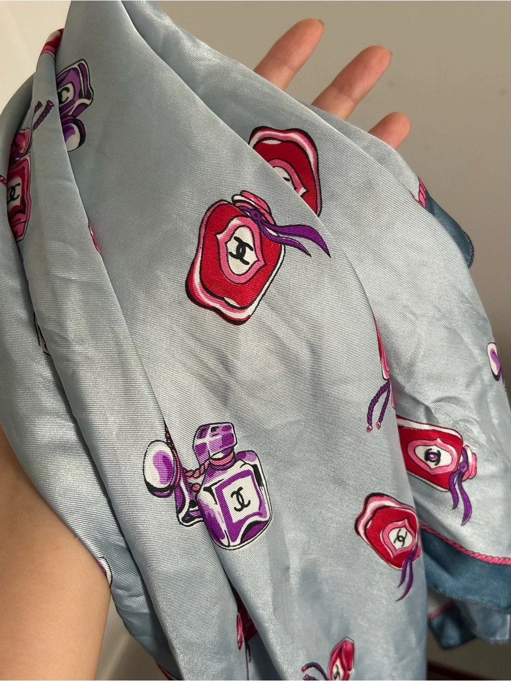 Chanel Light Blue Silk Scarf with Pink & Purple Perfume Motif